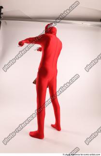 JOEL_ADAMSON CHRISTMAS VILLAIN WITH TWO GUNS